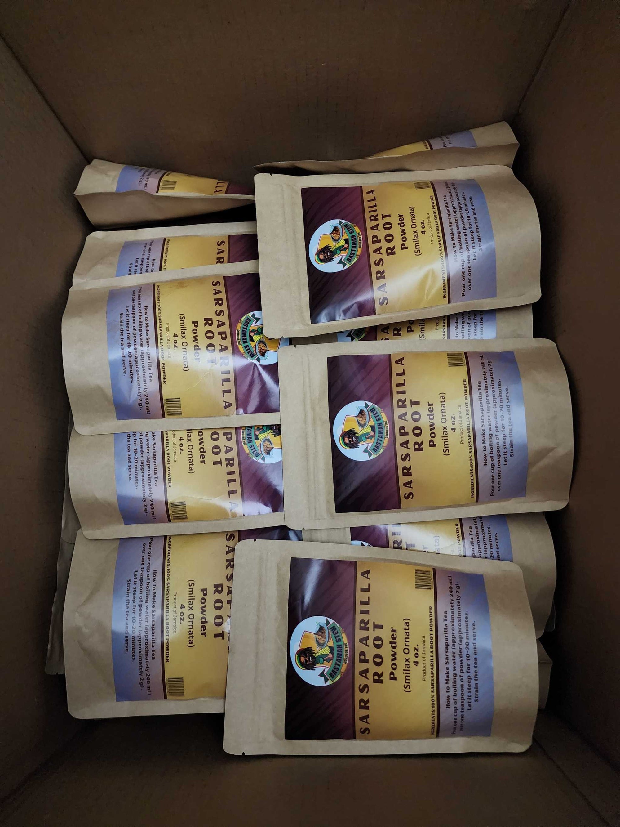 Sarsaparilla Powder Root Tea packages in a box.