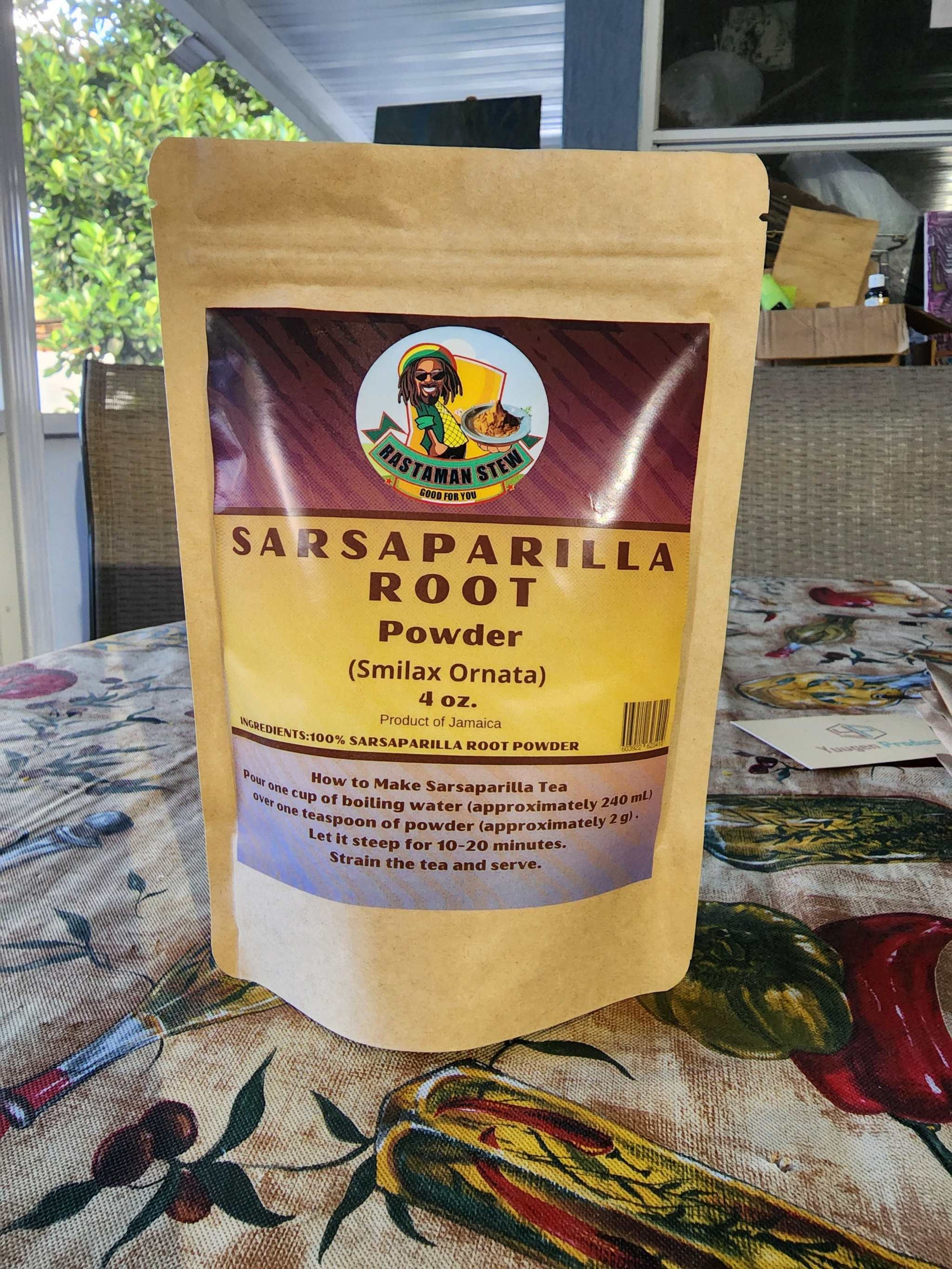 Sarsaparilla Powder Root Tea package on a table, showcasing healing properties benefits.