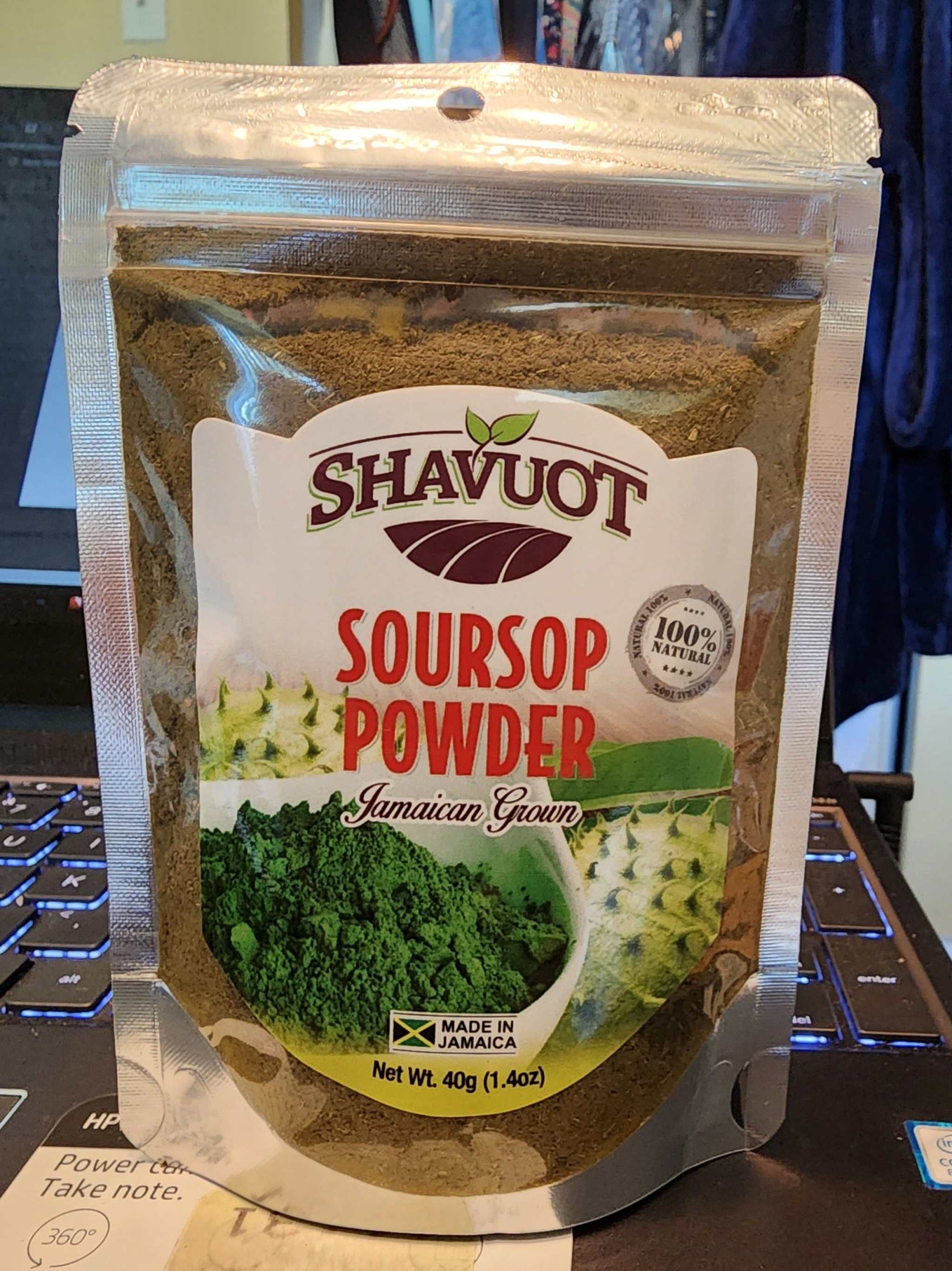 Shavuot Soursop powder package, Jamaican grown, 40g, displayed on a table.